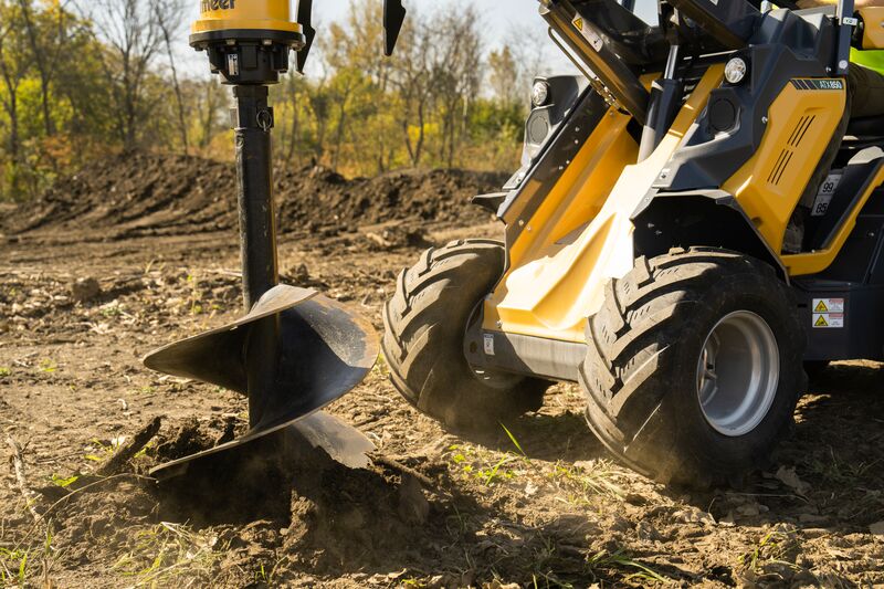Tree care auger attachment