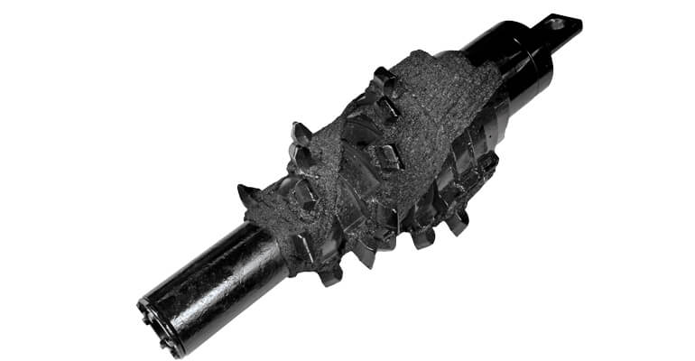 A black T-REX reamer made by Vermeer for horizontal directional drilling