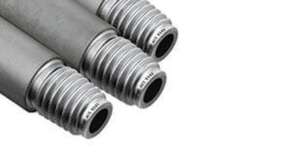 Close up of three silver series drill rods